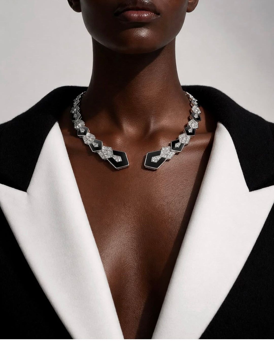 Obsidien is an exploration of bold geometry and striking monochrome. Defined by the interplay of deep black onyx and brilliant diamonds, the collection embodies confidence, precision, and modern sophistication